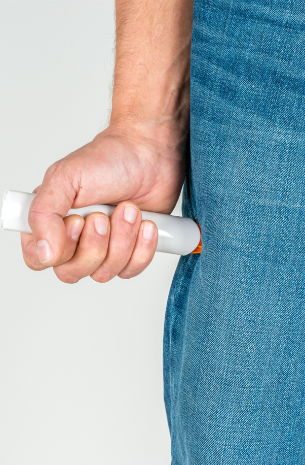 EpiPen being administered into thigh